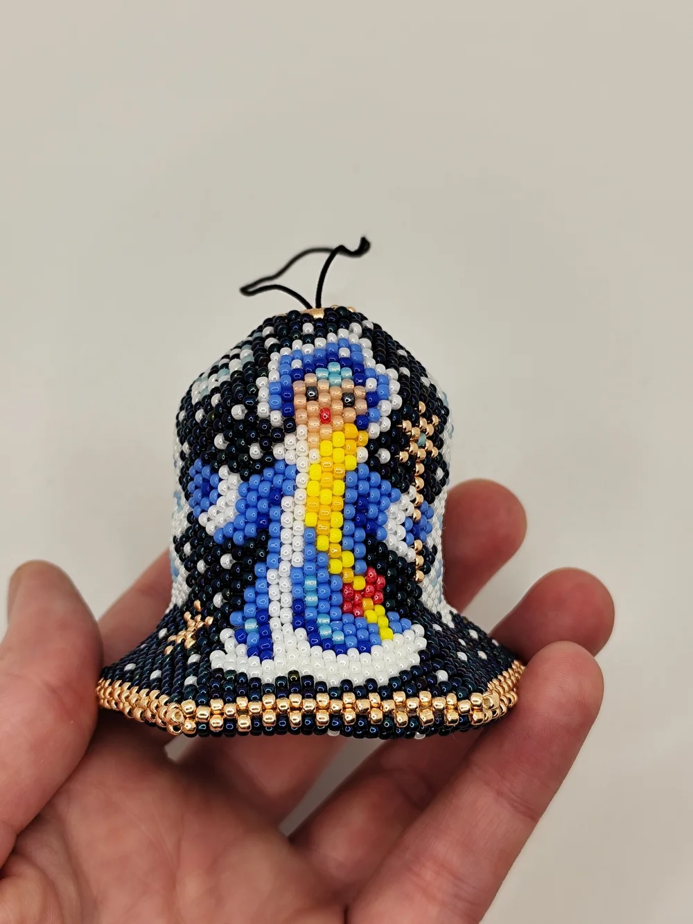 Handmade Blue Beaded Bell Ornament with Angel Design